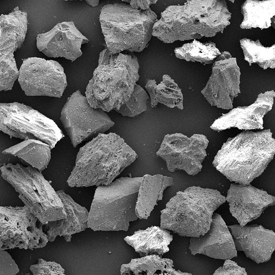 magnificed pumice particles showing foamed-stone character